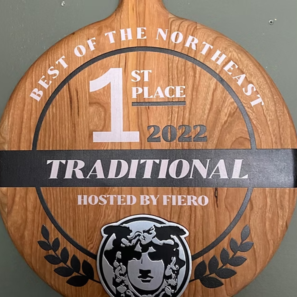 Casa Pizzeria's 2022 "Best of the Northeast Traditional" 1st Place award plaque, hosted by Fiero.