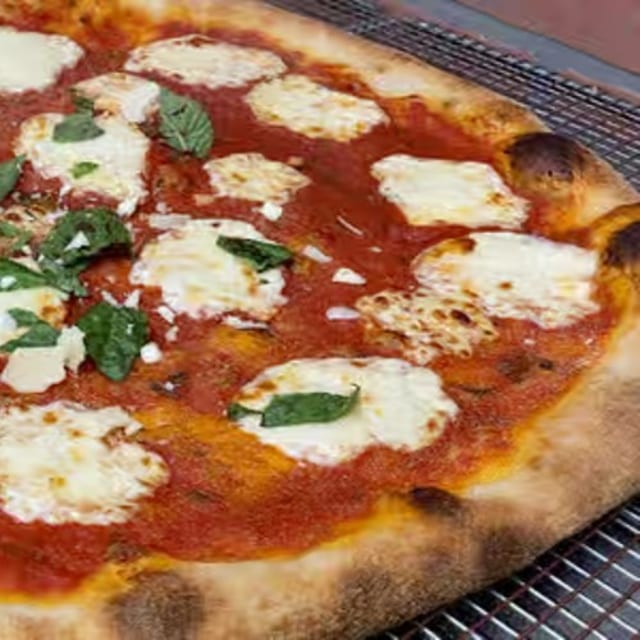 The Margherita Pizza (BEST Seller).